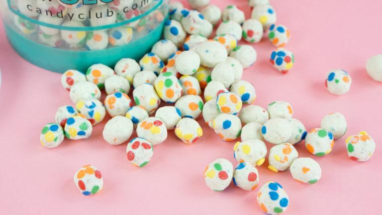 Candy Club candies spilling from a signature cup
